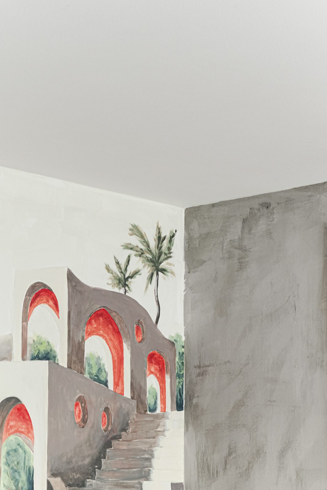 Detalle de arcos y escaleras del mural